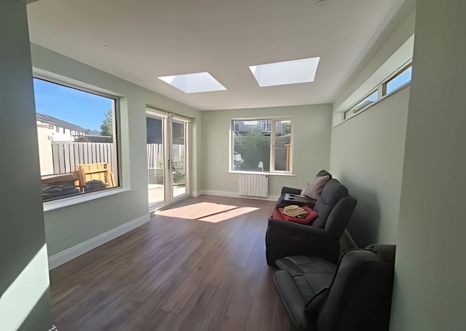 Light-filled Castleknock living room with rooflights