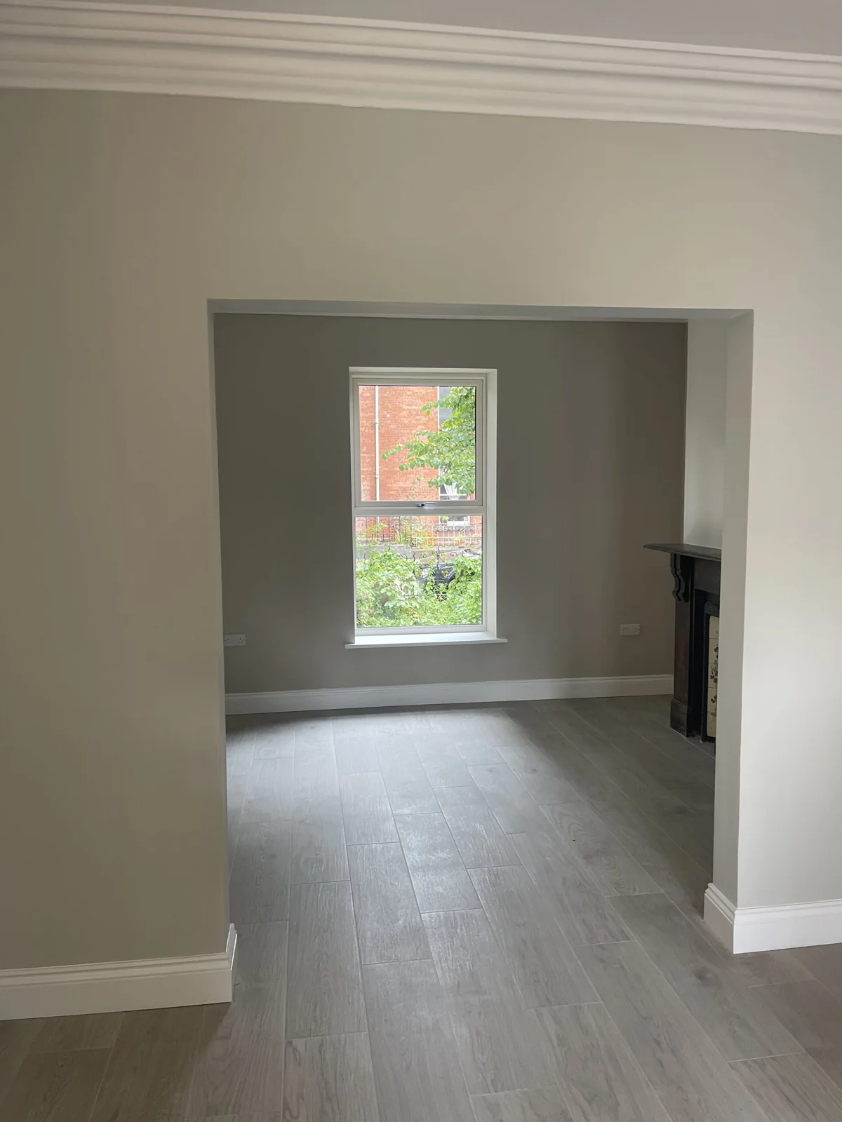 Renovated interior room with fireplace in Dublin 7