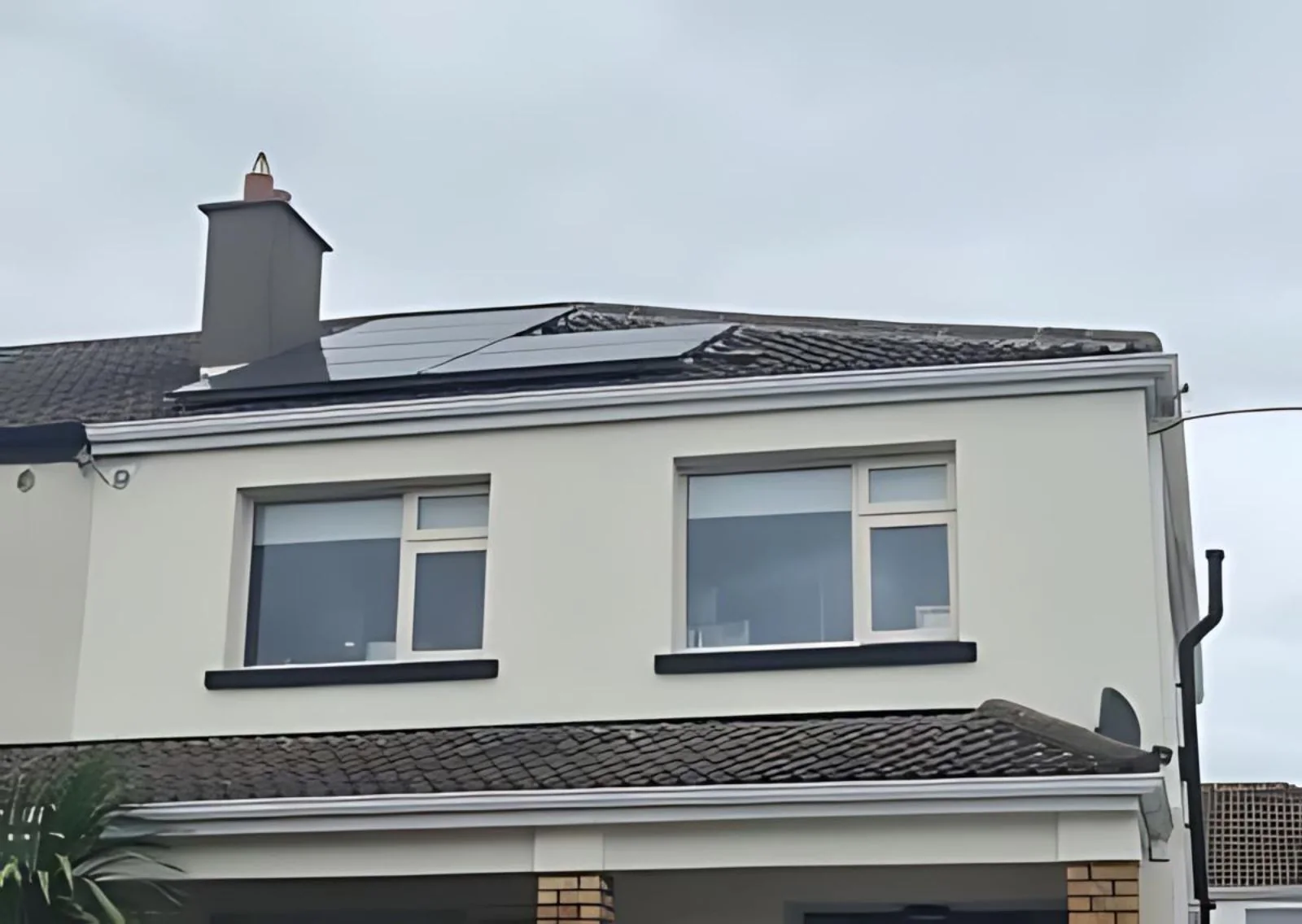 Rear elevation with roof-mounted solar panels in Malahide